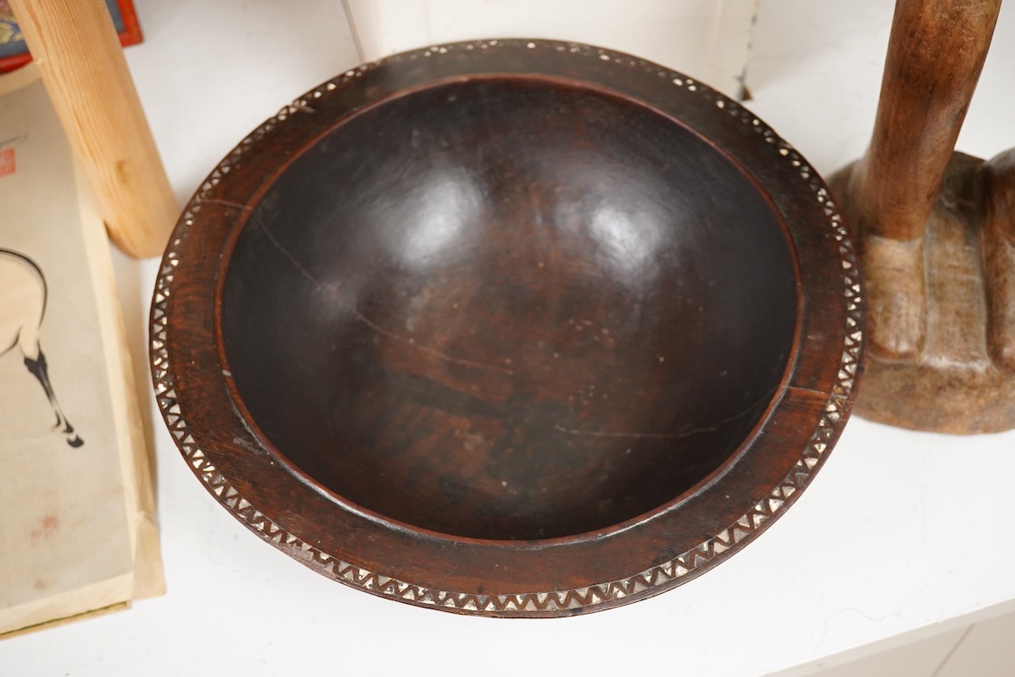 A Fijian carved wood Kava bowl and a West African Dogon fertility figure, 91cm tall